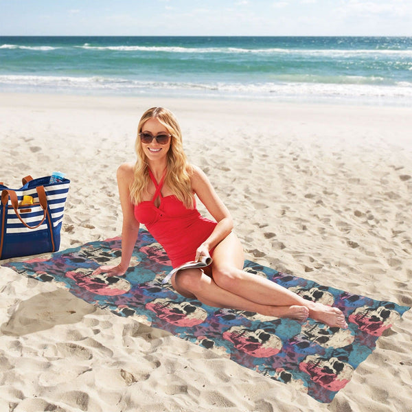 Introducing the stunning Blue Pink White Skulls Beach Towel - perfect for beach days and poolside lounging!