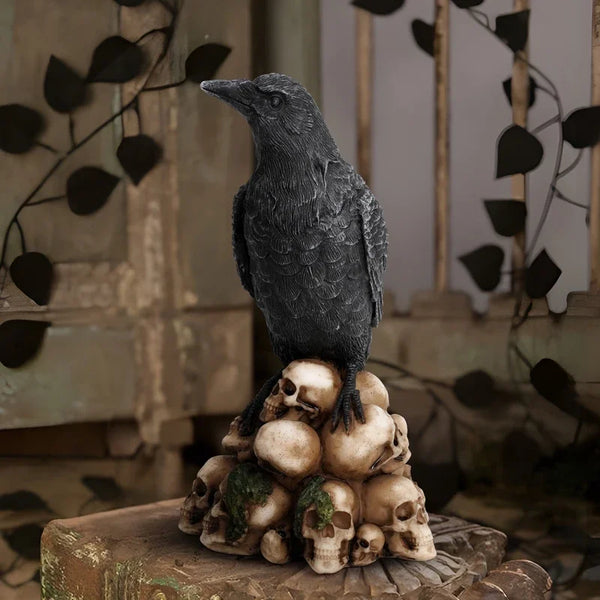 Raven or Black Cat Sitting On Skulls Decorative Figurines