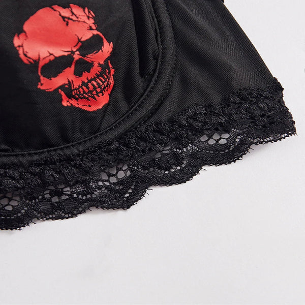 Black lace garment with a red skull design on a white background