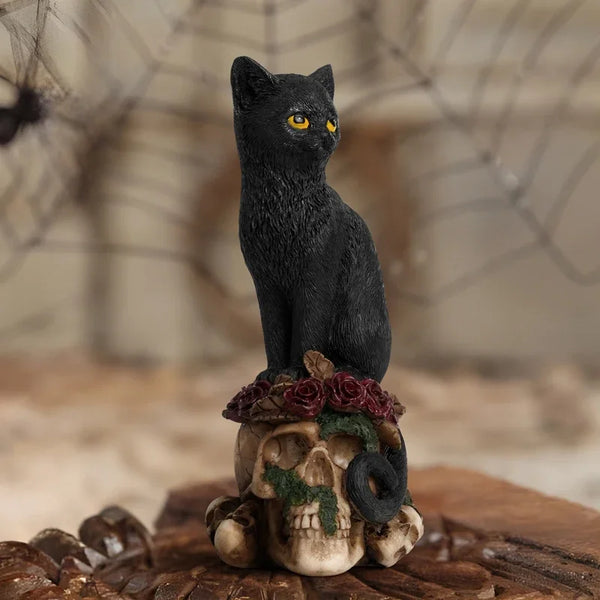 Raven or Black Cat Sitting On Skulls Decorative Figurines